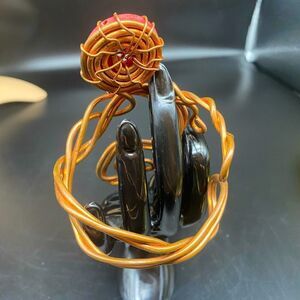 Ladies 7” copper twisted wire bracelet with circular stone accent set as crown